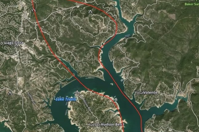 Satellite map with a red route line around Lake Travis area.